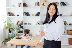 The concept of child psychology. A boy at the psychologist photo