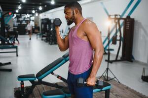 Portrait african american bodybuilder at gym intense intimidating glare expression conviction. photo