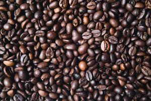 The Roasted coffee beans background. photo