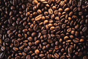 The Roasted coffee beans background. photo