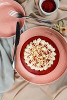 Premium Red Velvet cake include cream, sugar served on board isolated on napkin top view of cafe food photo