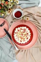 Premium Red Velvet cake include cream, sugar served on board isolated on napkin top view of cafe food photo