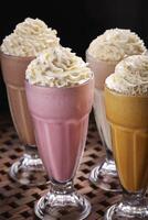 Assortment of Cookies and Cream Shake served in glass isolated on table side view of middle east food photo