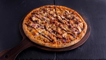 BBQ CHICKEN pizza isolated on cutting board top view on dark background italian fast food photo