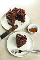 Chocolate Fudge Cake with fork and knife served in plate on food table top view cafe bake dessert photo