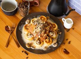 Chicken Waffle with Mushroom Milk with coffee beans, fork, spoon served in dish isolated on wooden table top view of taiwan food photo