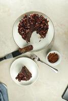 Chocolate Fudge Cake with fork and knife served in plate on food table top view cafe bake dessert photo