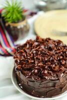chocolate Dulce de azúcar pastel servido en comida mesa parte superior ver café hornear postre foto