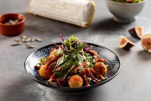 Goat Cheese balls with salad served in dish isolated on table top view of arabic breakfast photo