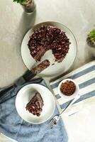 Chocolate Fudge Cake with fork and knife served in plate on food table top view cafe bake dessert photo