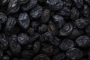 AI generated Dried fruit texture Black raisins, popular and delectable dried grapes photo