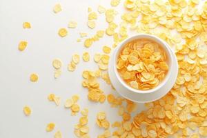 AI generated Scattered delight Corn flakes around a white cup on white photo