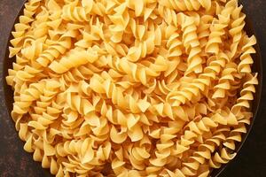 AI generated Carb delight Boiled egg noodles arranged in a spiral pattern photo