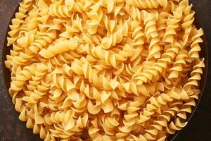 AI generated Carb delight Boiled egg noodles arranged in a spiral pattern photo