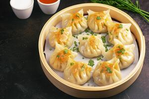 AI generated view Mouthwatering manti dumplings captured in alluring presentation on dark photo