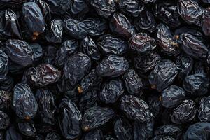 AI generated Dried fruit texture Black raisins, popular and delectable dried grapes photo