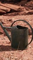 Beverage can in sand and rocks desert video