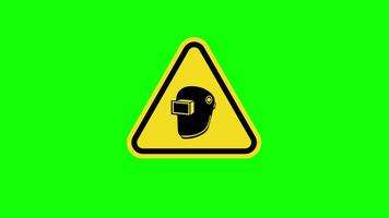 A yellow triangle warning Caution Wear Welding Helmet Sign icon concept animation with alpha channel video