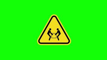 A yellow triangle warning Two Person heavy Lift sign icon concept animation with alpha channel video