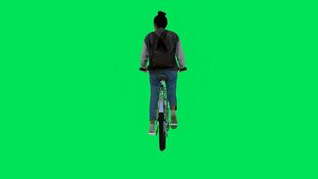 Teenage girl riding a bicycle from the back video