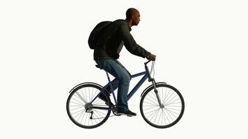 Middle aged African man riding a bicycle from side angle on a white screen video