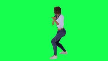 Female rapper performing freestyle in blue white dress, blue pants and white sho video