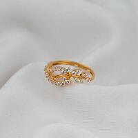 gold jewelry rings with plant designs photo