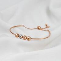 gold jewelry bracelet with four balls photo