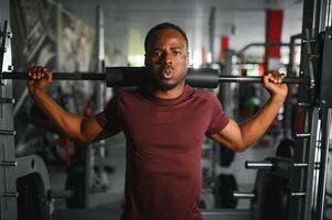 African American athlete working out in the gym photo