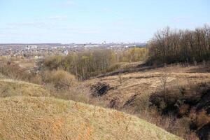 landscape with mountains, burn and sky, view of the city, mountains and trees in spring, spring photo