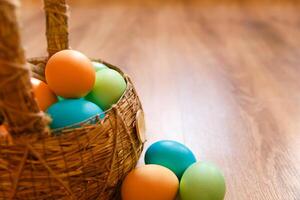 Paint eggs for Easter, bright Easter holiday, children paint eggs, colored eggs in a basket, colored eggs on a stand, Holiday background photo