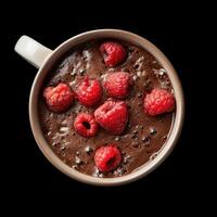 AI generated A dark chocolate raspberry cake in a mug on a dark background photo