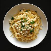 AI generated Pasta with feta cheese and parsley on a plate with a dark background photo