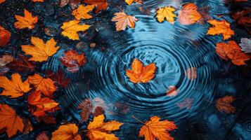 AI generated Several autumn leaves fall on the water surface and create small waves photo