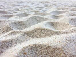 ai generado cerca arriba foto de el arena textura en el playa