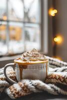 AI generated Mug with hot chocolate and whipped cream on a blanket with a window and lights in the background photo