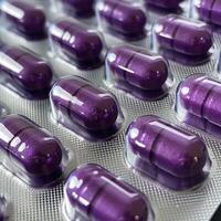 AI generated Blister pack containing numerous purple pills photo