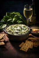 AI generated Creamy spinach and artichoke dip in a bowl with crackers and white wine next to it photo