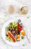 Breakfast homemade chicken sausage with boiled egg and fresh salad. Keto, ketogenic breakfast. Trendy breakfast. Top view, flat lay photo