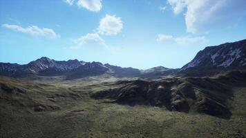 An aerial view of a mountain range in the mountains video