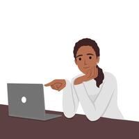 Black woman pointing at the laptop while smiling and holding her chin vector