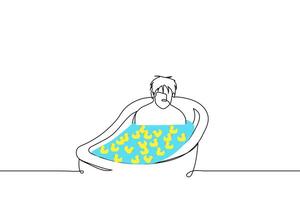 man is sitting in full bath and yellow rubber ducks are floating there - one line drawing vector. concept sad adult man taking a bath nostalgic for childhood vector