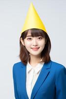 AI generated Happy asian girl wearing party hat for festive birthday celebration with copy space. Vertical photo