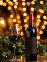 AI generated Red wine bottle and glass on wooden table with bokeh lights in the background photo