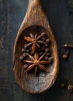 AI generated Star anise and cloves in wooden spoon photo