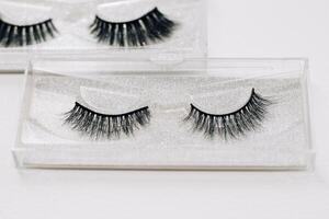 False decorative eyelashes on a white background. photo