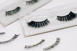 False decorative eyelashes on a white background. photo