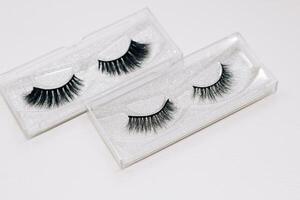 False decorative eyelashes on a white background. photo