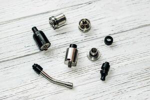 Parts for electronic cigarette vape, dripper, tank. photo