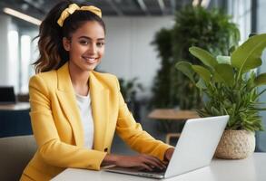 AI Generated Woman in yellow blazer working on laptop. Professional setting with a plant enhancing the cozy atmosphere. photo